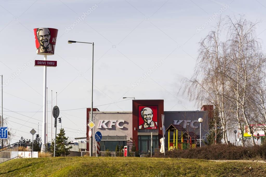 PRAGUE, CZECH REPUBLIC - FEBRUARY 25: KFC international fast food restaurant company logo on February 25, 2017 in Prague, Czech republic. KFC launches pizza on a fried chicken base.