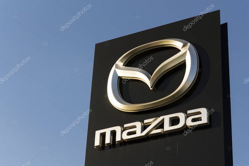 PRAGUE, CZECH REPUBLIC - MARCH 31: Mazda car company logo in front of dealership building on March 31, 2017 in Prague, Czech republic. Mazda set to launch new electric vehicle range by 2019.