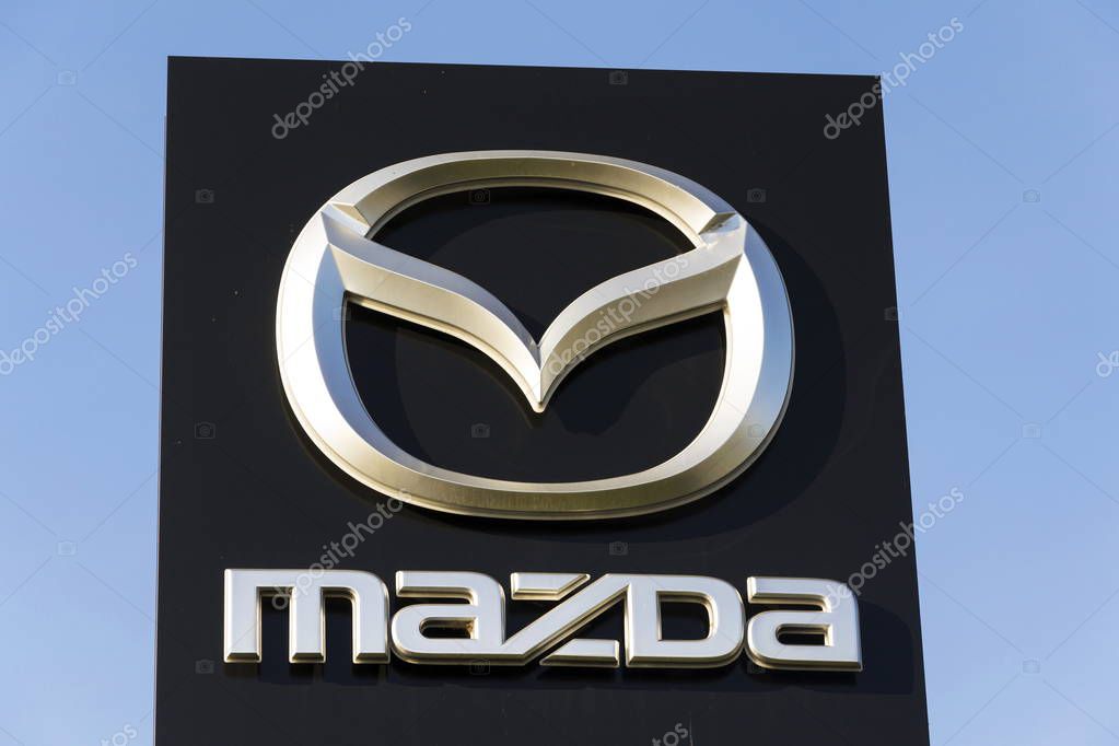 PRAGUE, CZECH REPUBLIC - MARCH 31: Mazda car company logo in front of dealership building on March 31, 2017 in Prague, Czech republic. Mazda set to launch new electric vehicle range by 2019.