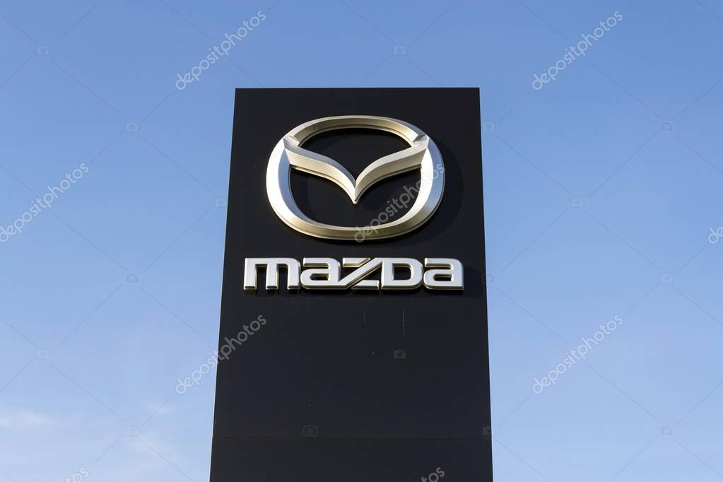 PRAGUE, CZECH REPUBLIC - MARCH 31: Mazda car company logo in front of dealership building on March 31, 2017 in Prague, Czech republic. Mazda set to launch new electric vehicle range by 2019.