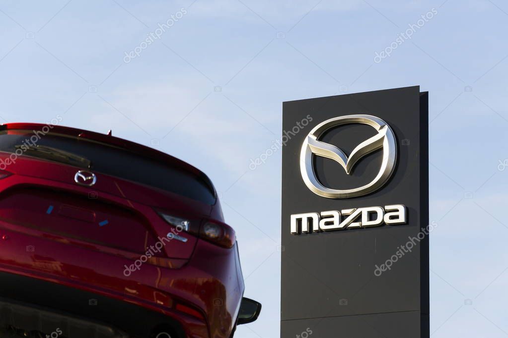 PRAGUE, CZECH REPUBLIC - MARCH 31: Mazda 3 car in front of dealership building on March 31, 2017 in Prague, Czech republic. Mazda set to launch new electric vehicle range by 2019.