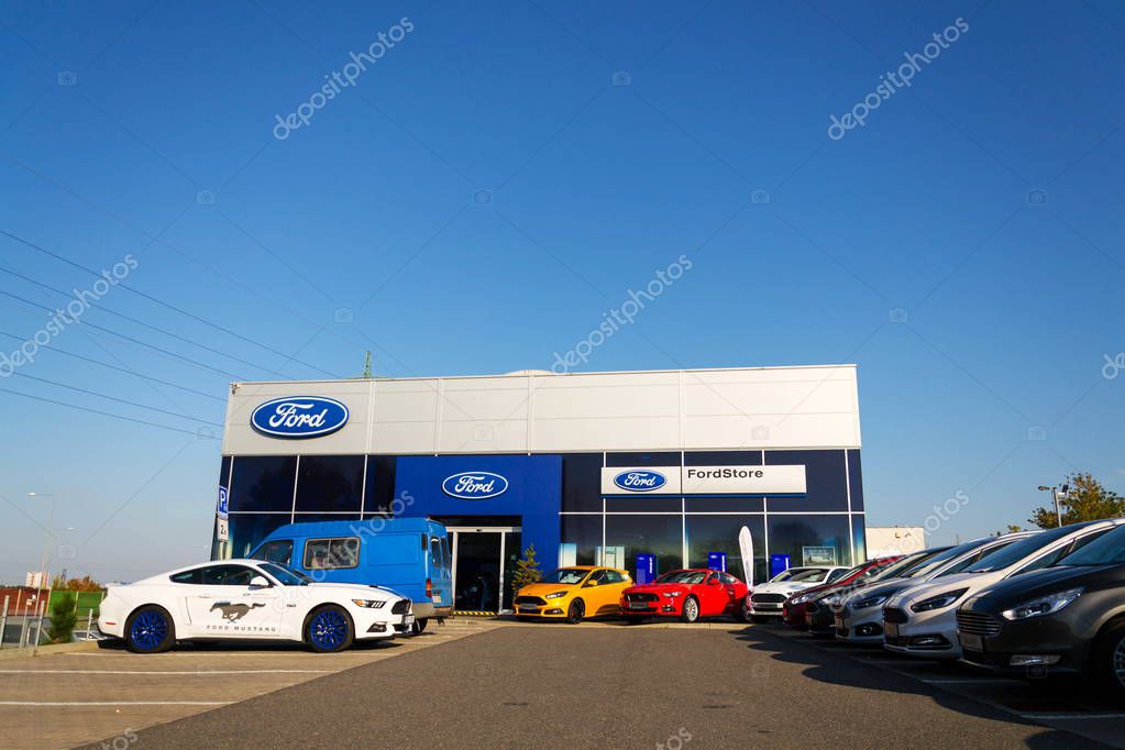 PRAGUE, CZECH REPUBLIC - SEPTEMBER 29: Cars in front of Ford motor company dealership building on September 29, 2017 in Prague. Ford and Lyft will work together to deploy autonomous cars.