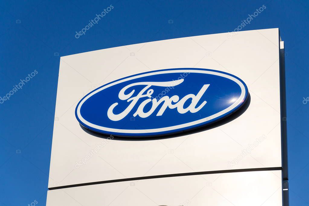 PRAGUE, CZECH REPUBLIC - SEPTEMBER 29: Ford motor company logo on dealership building on September 29, 2017 in Prague. Ford and Lyft will work together to deploy autonomous cars.