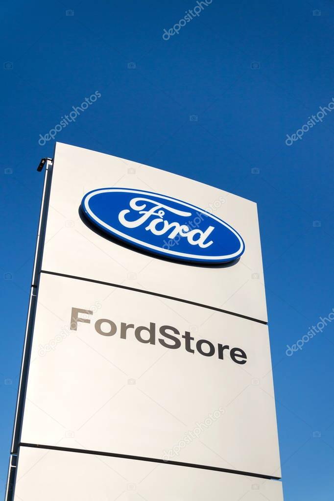 PRAGUE, CZECH REPUBLIC - SEPTEMBER 29: Ford motor company logo on dealership building on September 29, 2017 in Prague. Ford and Lyft will work together to deploy autonomous cars.