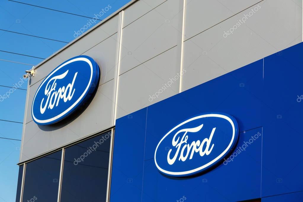 PRAGUE, CZECH REPUBLIC - SEPTEMBER 29: Ford motor company logo on dealership building on September 29, 2017 in Prague. Ford and Lyft will work together to deploy autonomous cars.