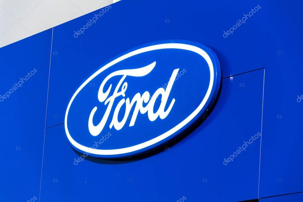 PRAGUE, CZECH REPUBLIC - SEPTEMBER 29: Ford motor company logo on dealership building on September 29, 2017 in Prague. Ford and Lyft will work together to deploy autonomous cars.