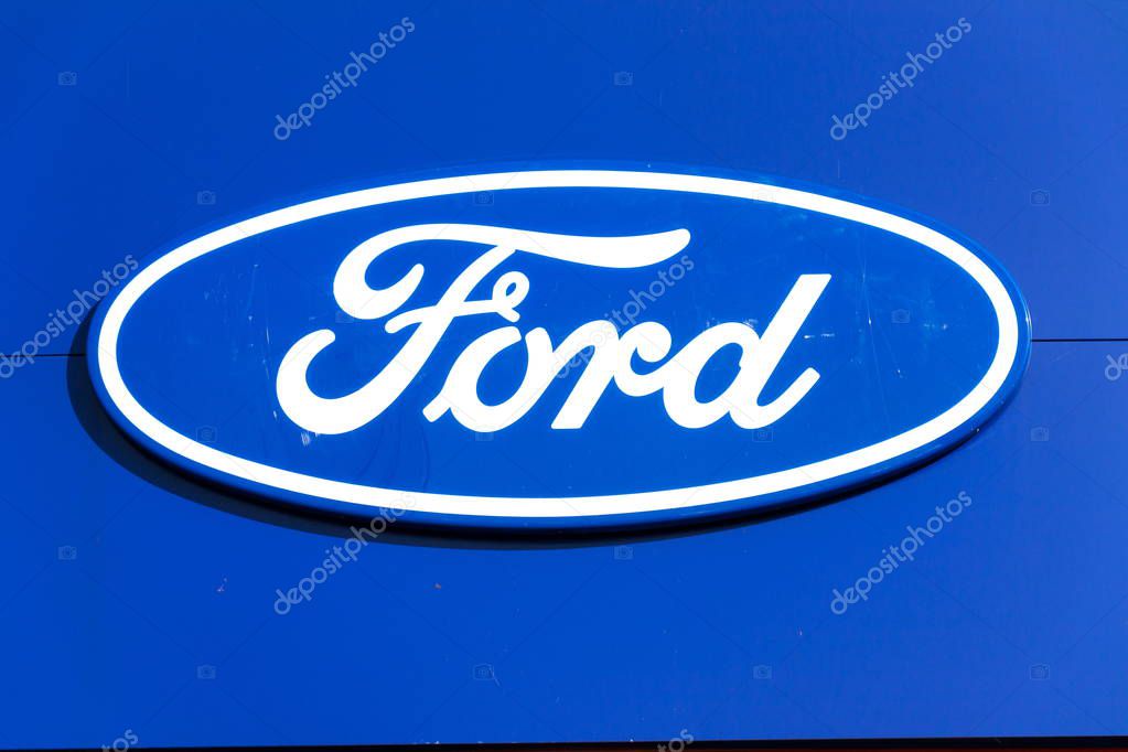 PRAGUE, CZECH REPUBLIC - SEPTEMBER 29: Ford motor company logo on dealership building on September 29, 2017 in Prague. Ford and Lyft will work together to deploy autonomous cars.