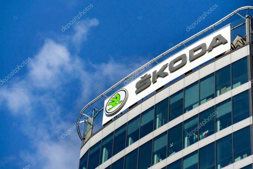 PRAGUE, CZECH REPUBLIC - OCTOBER 14: Skoda Auto automobile manufacturer from Volkswagen Group company logo on headquarters building on October 14, 2017 in Prague, Czech republic. Skoda plans 5 fully-electric vehicles on sale by 2025.