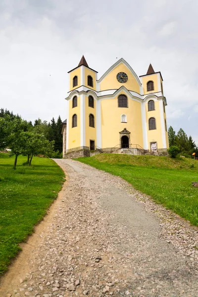 Church of Assumption in sunny mountains, Neratov, Czech republic — Stock Photo, Image