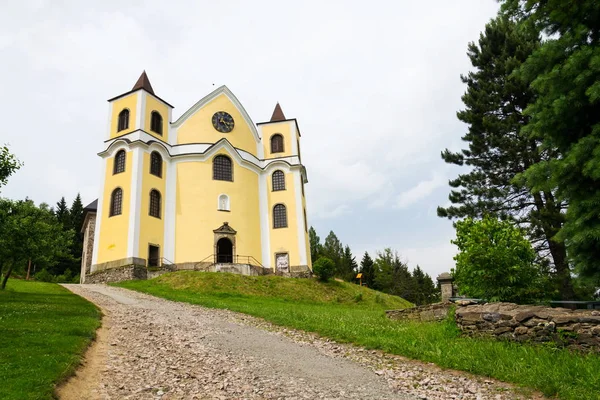 Church of Assumption in sunny mountains, Neratov, Czech republic — Stock Photo, Image