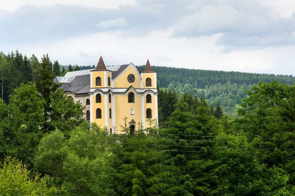 Church of Assumption in sunny mountains, Neratov, Czech republic — Stock Photo, Image