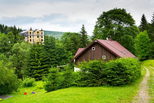 Church of Assumption in sunny mountains, Neratov, Czech republic — Stock Photo, Image