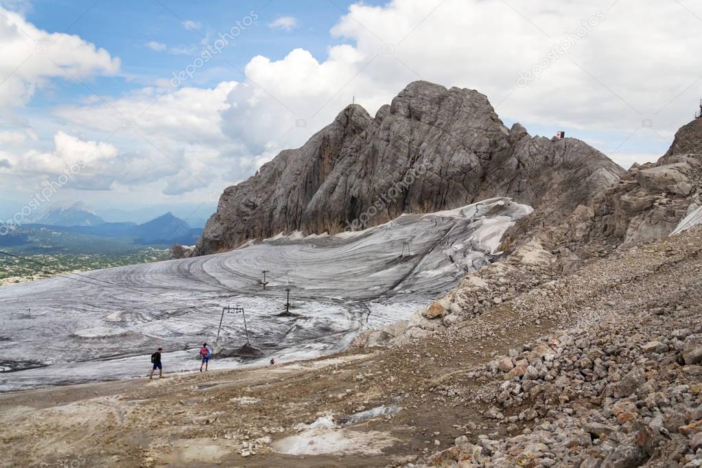 People climbing via Koppenkarstein ferrata near Dachstein glacier, Austrian Alps