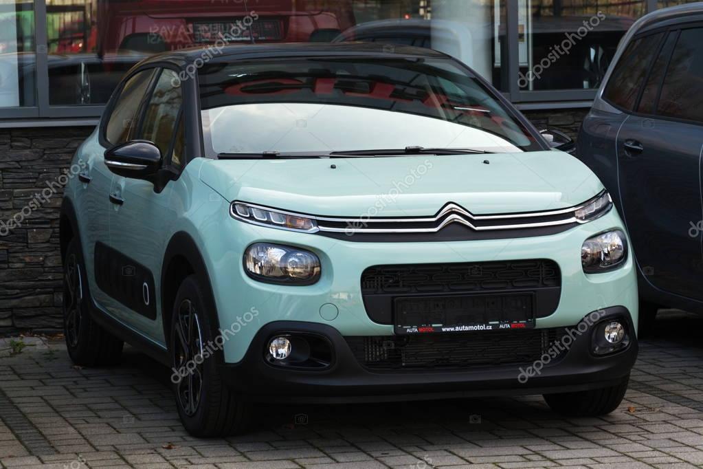 PRAGUE, CZECH REPUBLIC - NOVEMBER 5: Citroen C3 car in front of dealership building on November 5, 2017 in Prague. Citroen prepares EV push with 80 per cent electrified range by 2023.