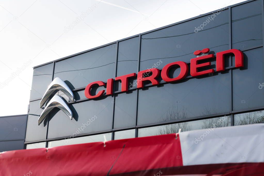 PRAGUE, CZECH REPUBLIC - NOVEMBER 5: Citroen car company company logo in front of dealership building on November 5, 2017 in Prague. Citroen prepares EV push with 80 per cent electrified range by 2023.