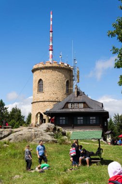KAJOV, CZECH REPUBLIC - AUGUST 12: People on the oldest Czech stone lookout tower - Josefs lookout tower at Mount Klet in Blansky forest on August 12, 2017 in Kajov, Czech Republic. clipart