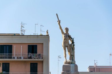 Victor Emmanuel II of Italy statue, king of Sardinia and united Italy, blue clear sky background