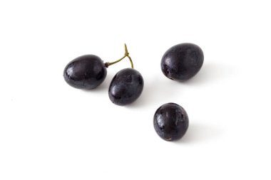 Four black grapes