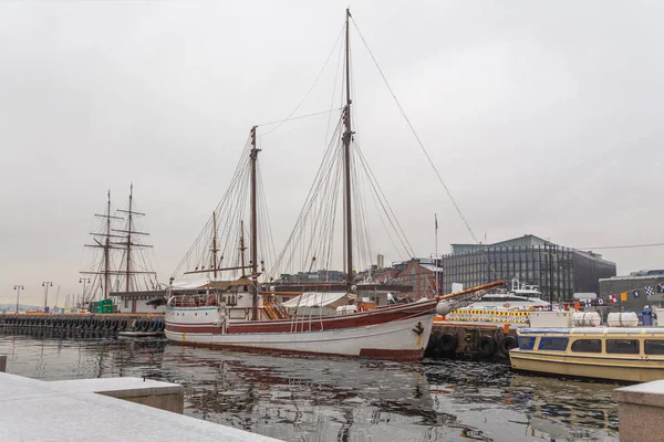 Sailing ships in winter berth in the port of Oslo