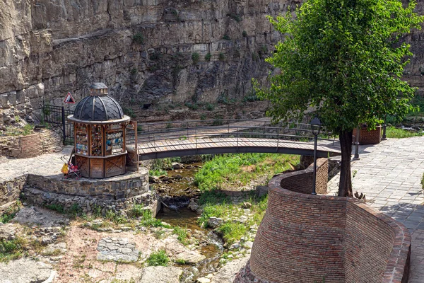 Tourist pedestrian zone at the bottom of the gorge of the mountain canyon in Tbilisi