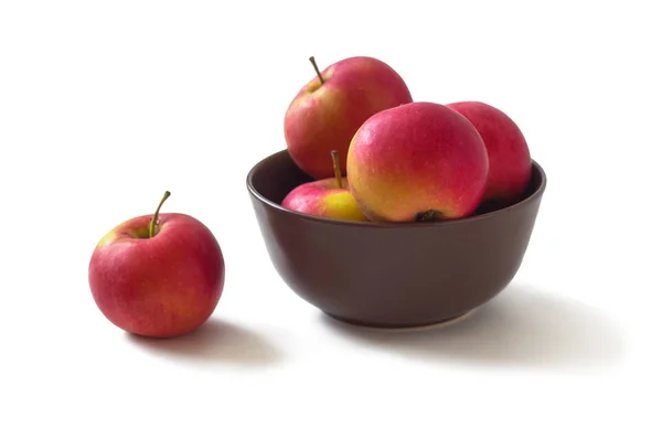 The apples in the brown bowl — Stock Photo, Image