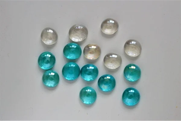 Shiny glass stones, clear and aquamarine colors — Stock Photo, Image