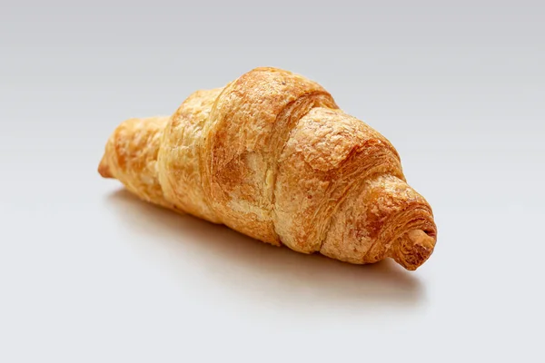 Fresh mini croissant with a Golden crust on a white background — Stock Photo, Image