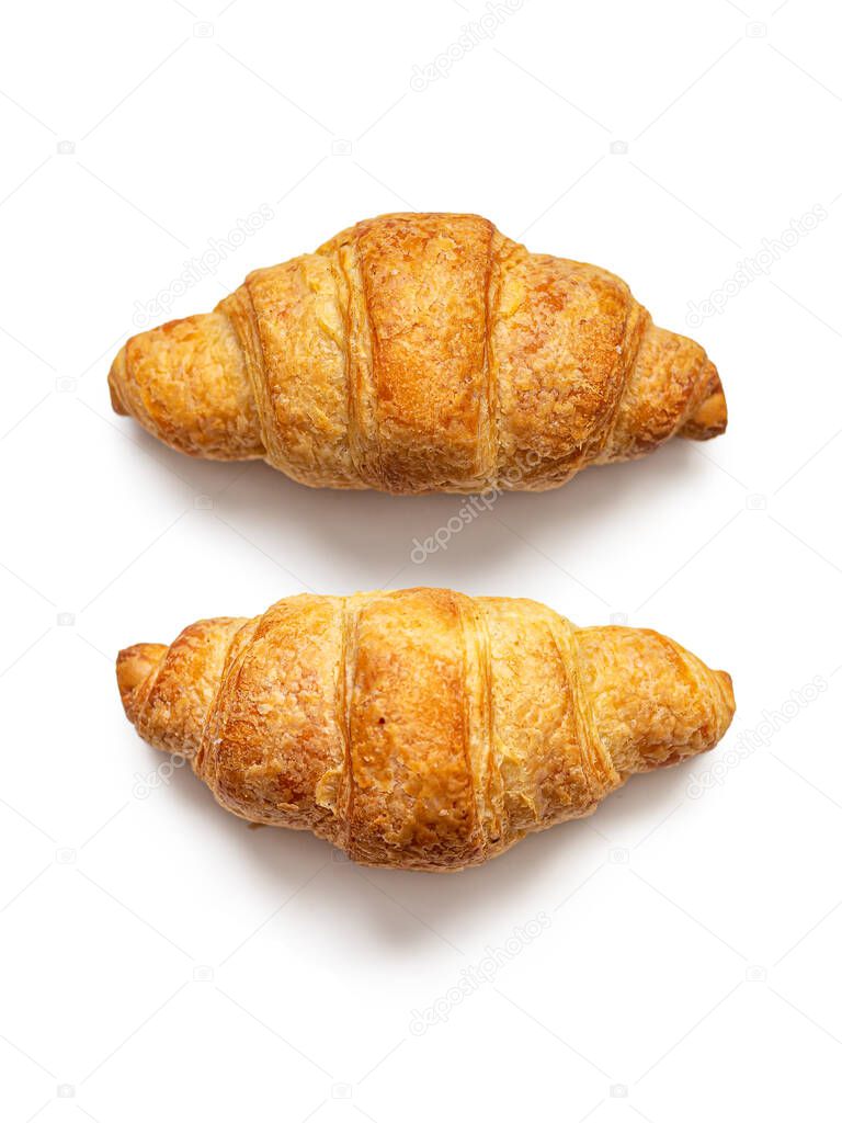 Croissants with a Golden crust on a white background
