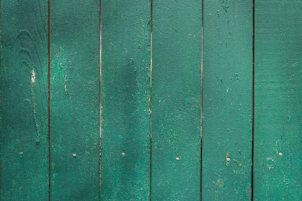 Old green, wooden fence — Stockfoto