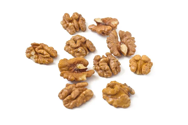 Walnuts on a white table — Stock Photo, Image