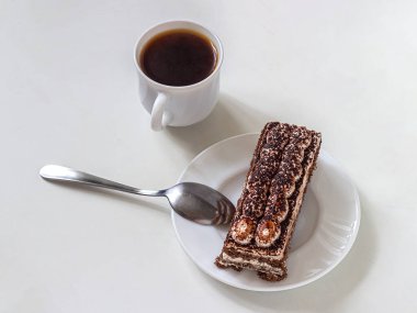 Breakfast with coffee and tiramisu