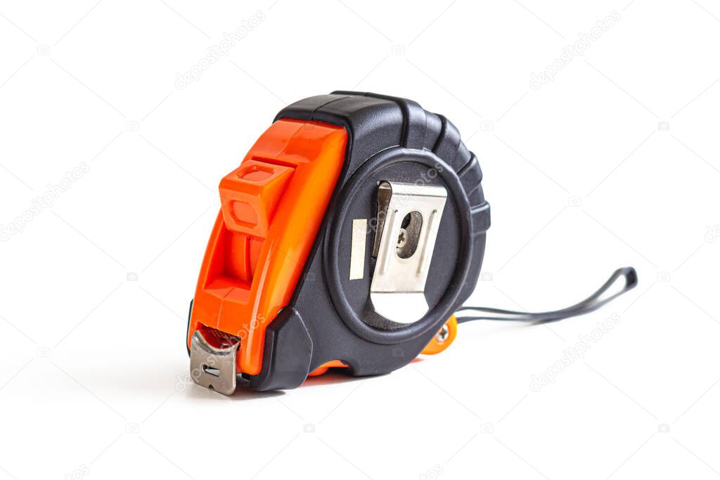 Measuring tape measure, with a black and orange plastic case, isolated on a white background