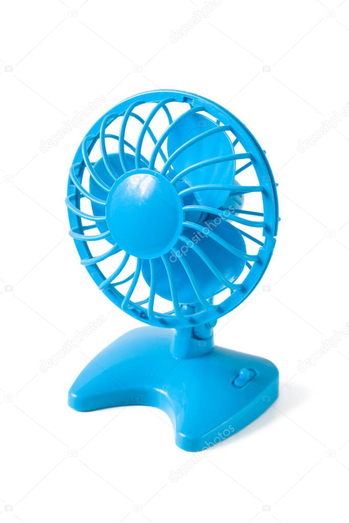 Small blue fan with propeller and battery isolated on white background