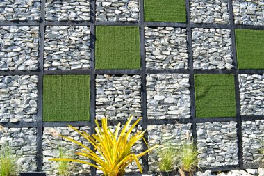 Tayland 'daki süs bahçesinde desenli duvar 