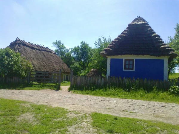 Hilly area of the park / museum Ukrainian Village of the 17th century with houses, churches, mills of the time