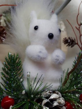  close-up of abstract, bright, Christmas background from garlands, Christmas tree, decorations, snow, berries and fruits, toys, ice