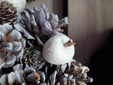  close-up of abstract, bright, Christmas background from garlands, Christmas tree, decorations, snow, berries and fruits, toys, ice