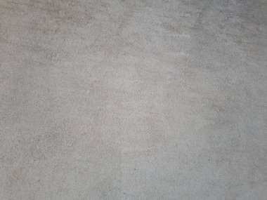  Bokeh efekti ve karakteristik kaba gözenekli dokusu, soyut koyu ve aydınlık lekeleri olan dekoratif bir duvarın yakın çekimi.