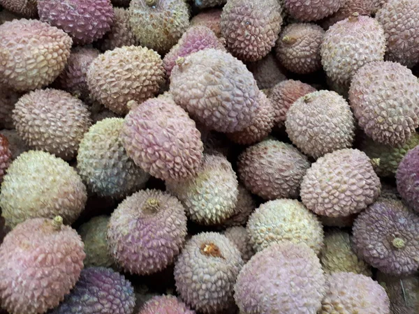 close-up of exotic lychee fruit on a counter in a store