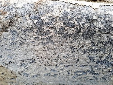  Lekeleri, desenleri ve bulanıklığı olan soyut bir duvarın yakın çekimi. Duvar kağıtları, kartlar, arkaplanlar için tasarım.