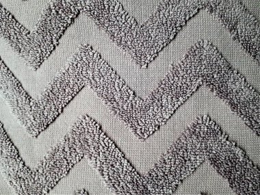 Lekeli, desenli ve bulanık tüylü, yoğun kumaş. Perdeler, havlular, masa örtüleri, kapaklar, duvar kağıtları için tasarım.