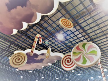 Bulutlu ve renkli şekerli bir gökyüzü şeklinde bulanık / bokeh efektli soyut dekorun yakın çekimi. Kartlar, ekran koruyucular, duvar kağıtları, kapaklar için tasarım.