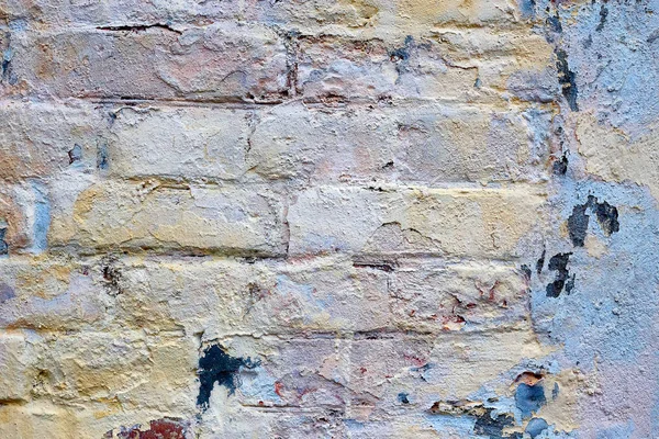 Loft textura dañada, papel pintado y fondo con ladrillos reb pintados y un poco de color en él — Foto de Stock