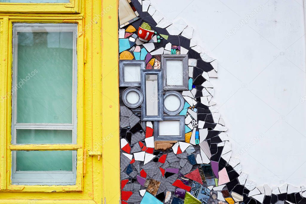 Colorful background with ceramic pieces and bright yellow window