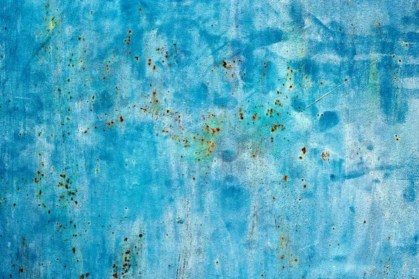 Painted in blue iron old damaged texture, wallpaper and background, close-up