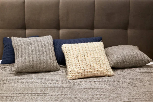 Cozy scandinavian style pillows on a sofa