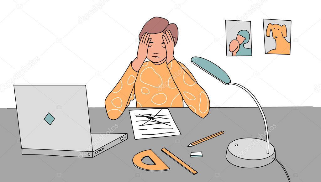 Boy at home in stress doing hard homework or prepare for exam