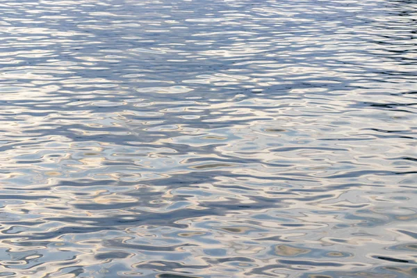 Struttura astratta dello sfondo di acqua di mare al tramonto — Foto Stock