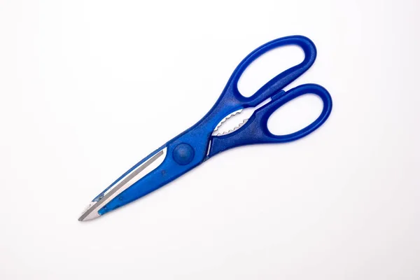 Blue kitchen scissors close up on white background — Stok fotoğraf