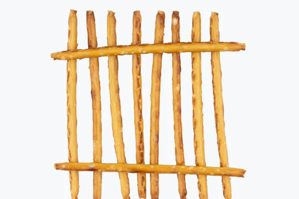 Snack palitos salados sobre un fondo aislado —  Fotos de Stock